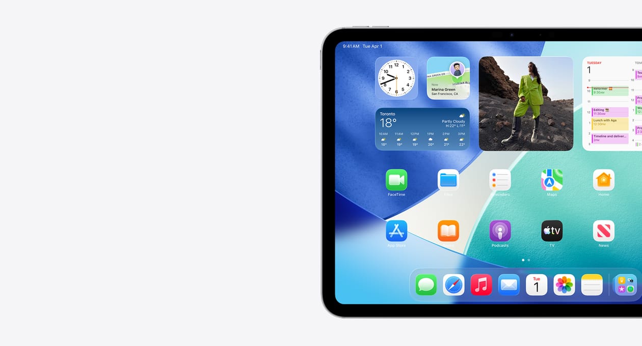 iPad, landscape orientation, left side of screen only, Home Screen with stacked widgets including translucent clock showing Liquid Glass effect, Find My app, Weather widget, two rows of smaller apps, and the dock