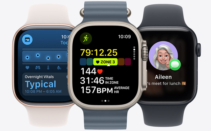 Drie Apple Watch-modellen, in het midden een model in de kleur Naturel met een hardloopwork-out en hartslagstatistieken, rechts een model in Gitzwart met een Genmoji, links een model in Roségoud, de wijzerplaat toont Vitale functies