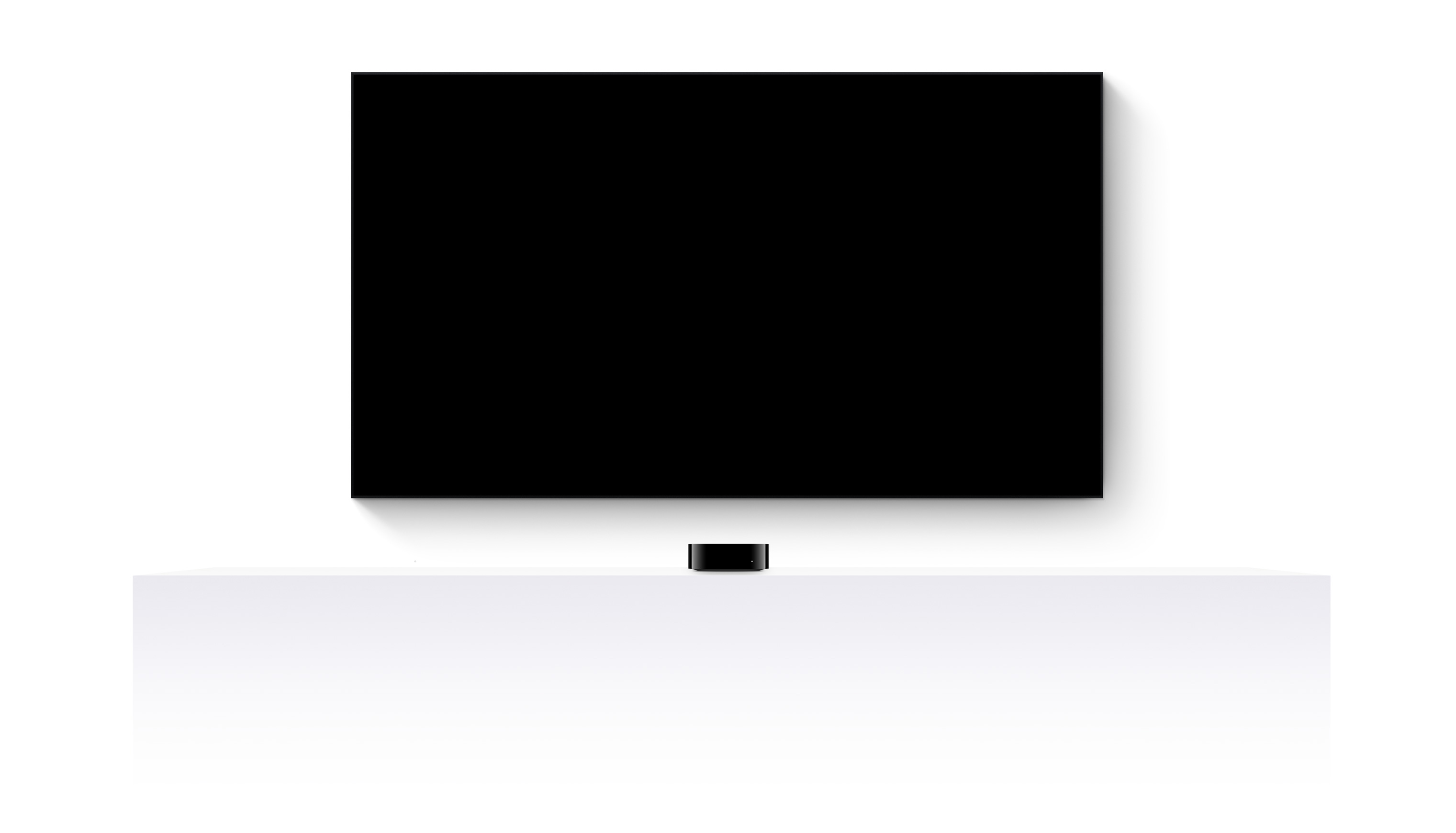 Apple TV 4k, two HomePods, and a flatscreen television showing Jurassic World Rebirth
