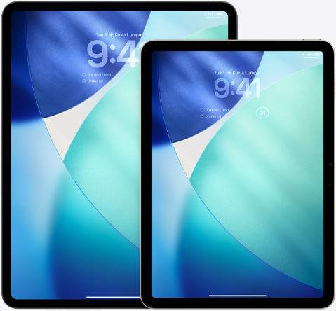 iPad and iPad Air, side by side, iPad Air in front overlapping iPad, portrait orientation, Lock Screen shows time in translucent Liquid Glass